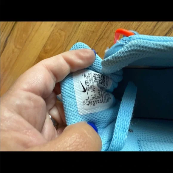 Nike Sky Blue Sneakers with Orange Accents - Picture 3 of 4